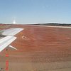 e) AirportOfTheRedSand.jpg